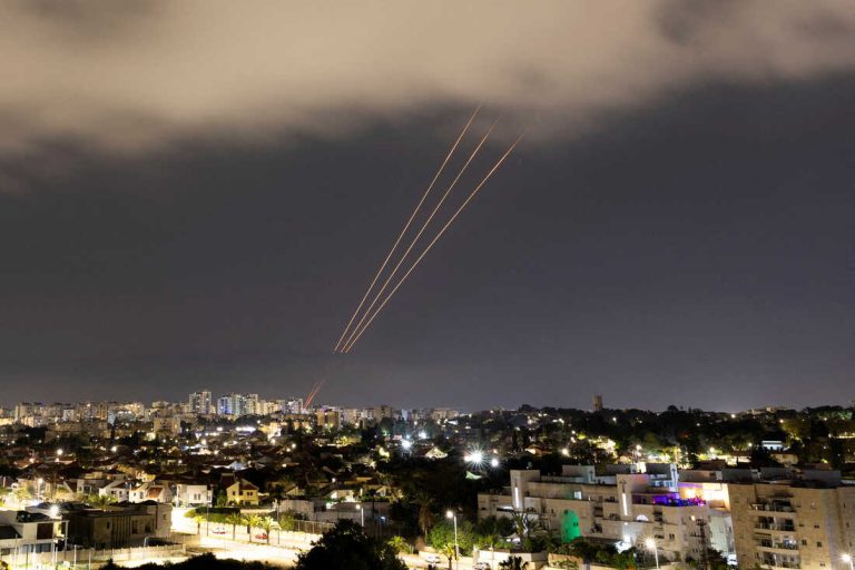 FILE PHOTO: An anti-missile system operates after Iran launched drones and missiles towards Israel, as seen from Ashkelon