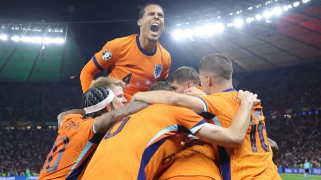 Netherlands players celebrate their winning goal