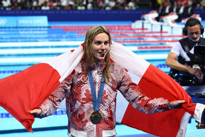 Swimming-Golden Summer helps Canada deal with gloomy scandal