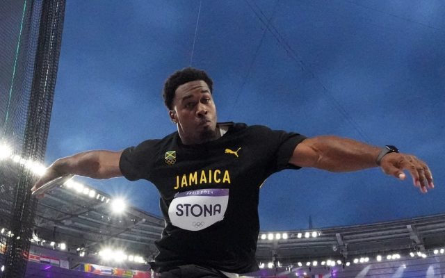 Jamaica's Stona upsets Alekna to win discus gold 