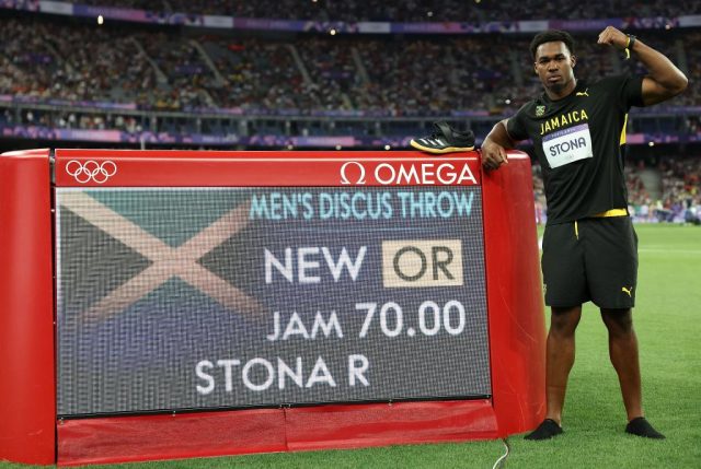  Roje Stona Wins Jamaica's First Olympic Gold In Men's Discus With Record Throw