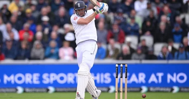 Jamie Smith hitting a boundary-AFP