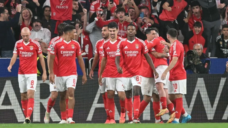 Benfica players celebrate after scoring against Atletico Madrid in the Champions League.