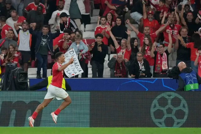 Benfica’s Alexander Bah celebrates after scoring his side’s third goal against Atletico Madrid in Lisbon