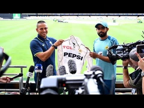 Babar Azam giving the jersey to Usman Khawaja-AFP