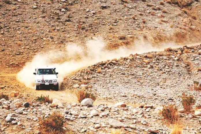 Ali Magsi's car meets with an accident in the Jhal Magsi Desert Challenge Jeep Rally