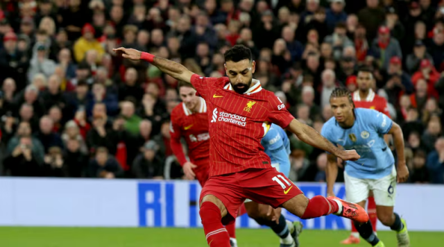 Liverpool beat Man City 2-0 to go nine points clear