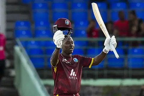 Sherfane Rutherford Celebrating his Century-AFP