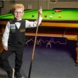 A 5-year-old British boy has become the new surprising talent in the snooker world.-X