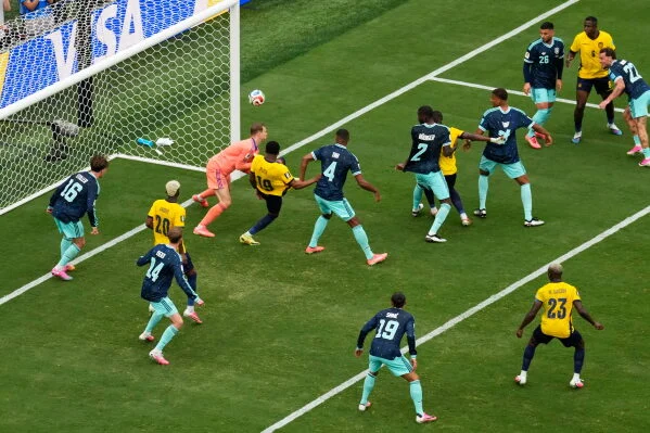 Ecuador's Gonzalo Plata (19) scores a go-ahead goal on Germany goalkeeper Manuel Neuer during the World Cup Group E soccer match in East Rutherford, N.J., near Thursday, June 25, 2026. (AP Photo/Seth Wenig)